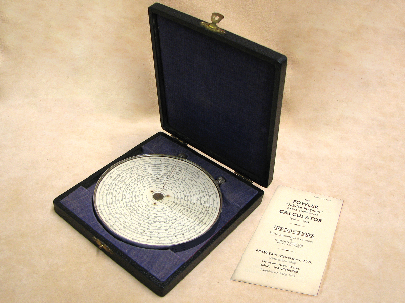 Fowler's Jubilee Magnum Extra Long Scale calculator in presentation case